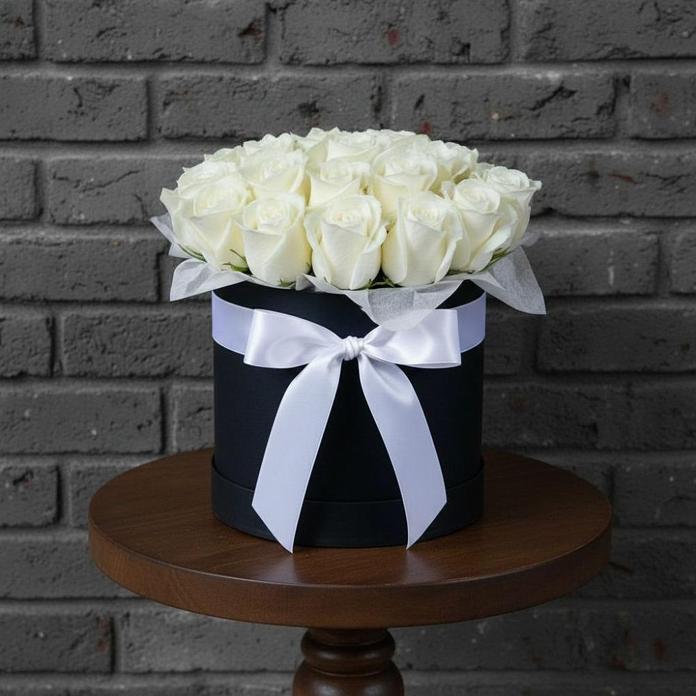 Цветочная композиция из Розы в шляпной коробке в Котласе